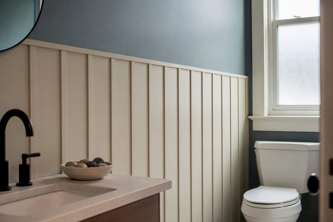 Vertical board-and-batten bathroom wall panels
