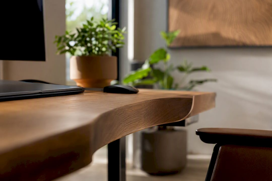 Detailed view of ergonomic wooden desk edge
