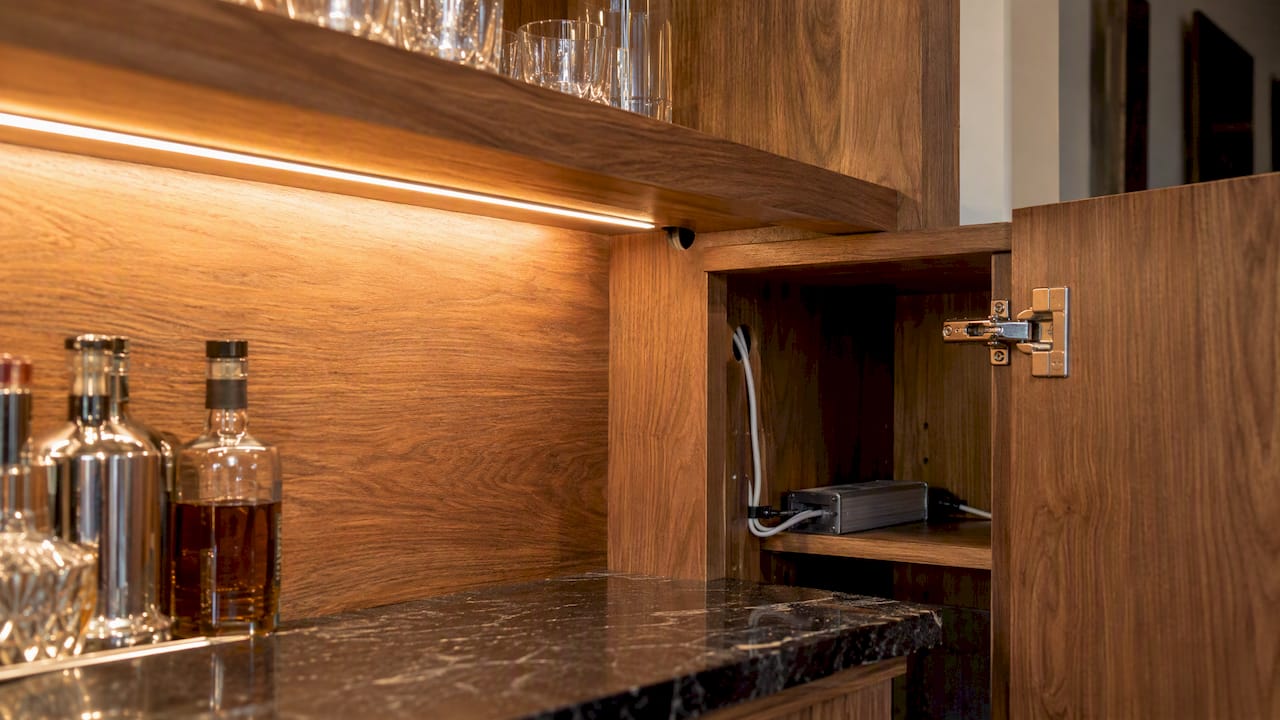 Routed LED channel inside custom wood shelving